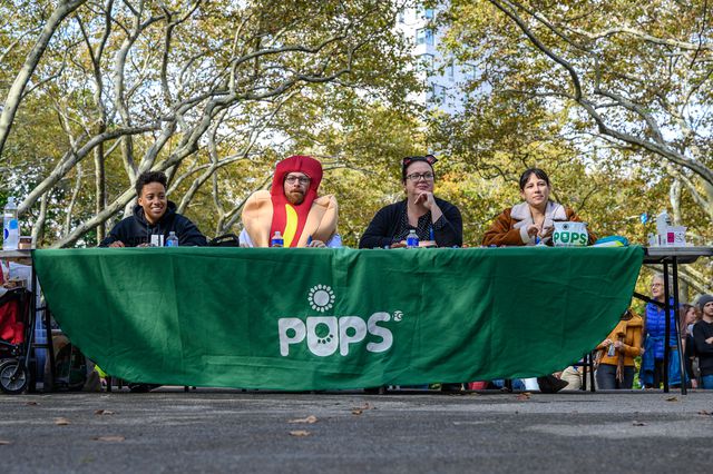 A photo of Ben Yakas as judge of the 2021 Great PUPkin Contest in Ft. Greene